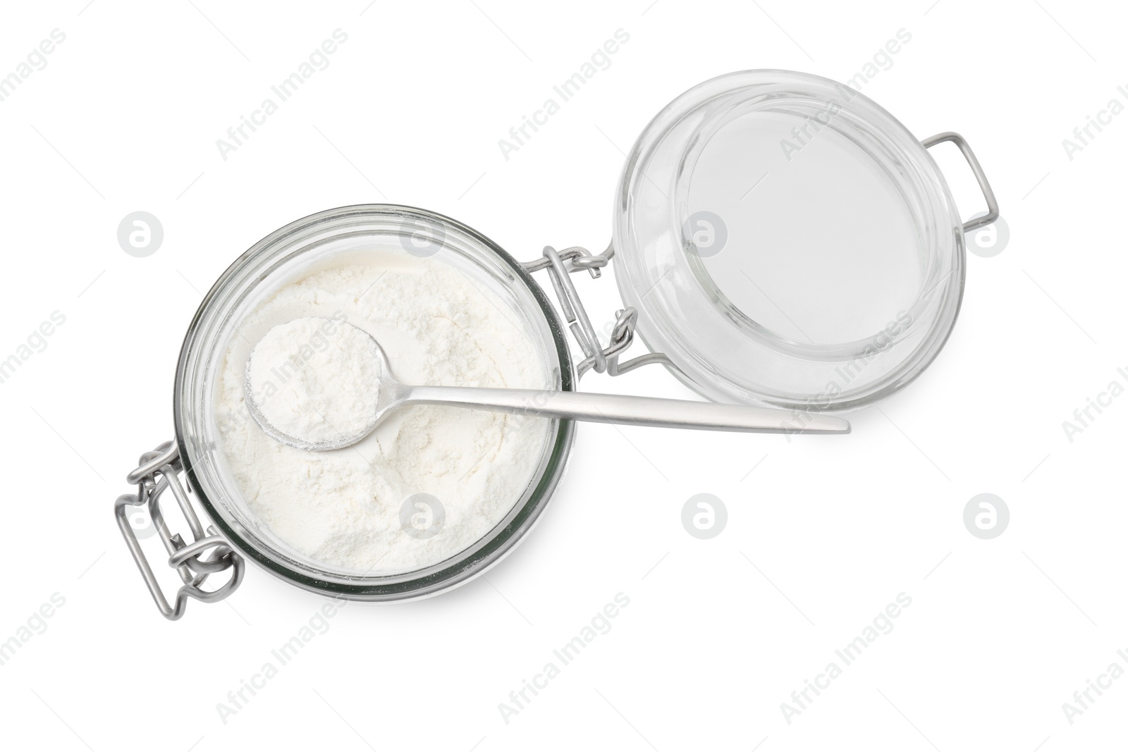 Photo of Baking powder in glass jar and spoon isolated on white, top view