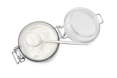 Photo of Baking powder in glass jar and spoon isolated on white, top view