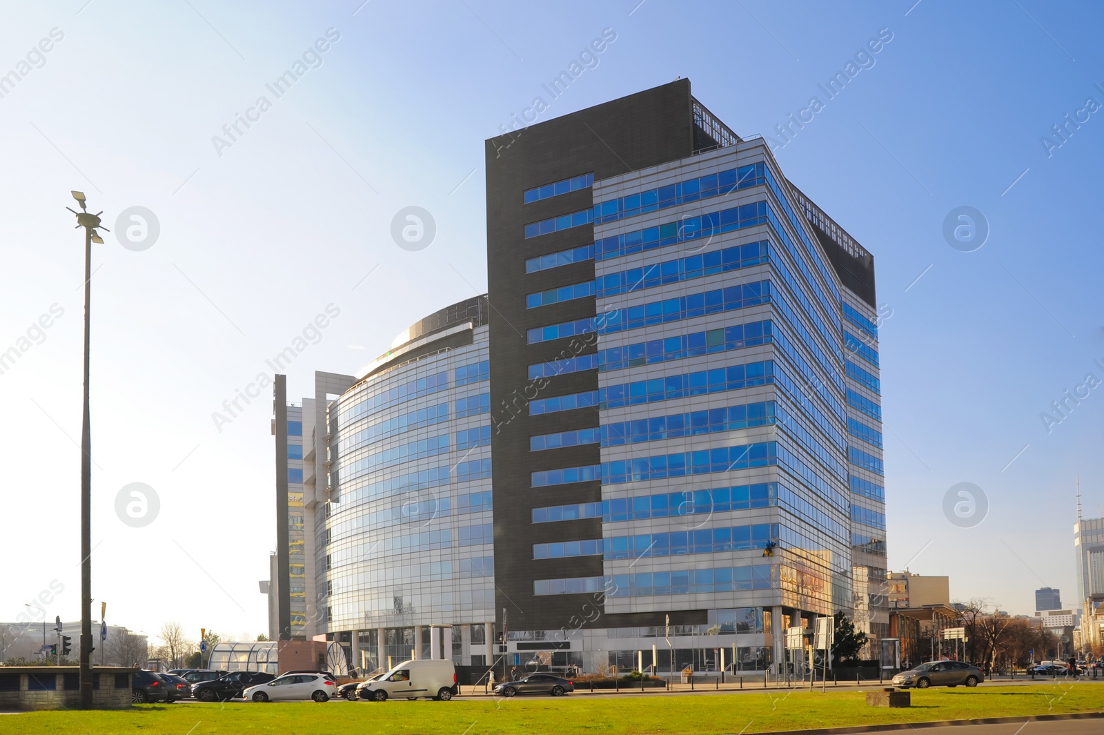 Photo of View of cityscape with modern buildings on sunny day