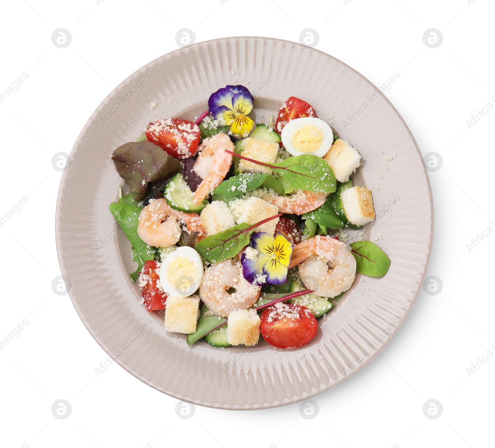 Photo of Plate of delicious Caesar salad with shrimps isolated on white, top view