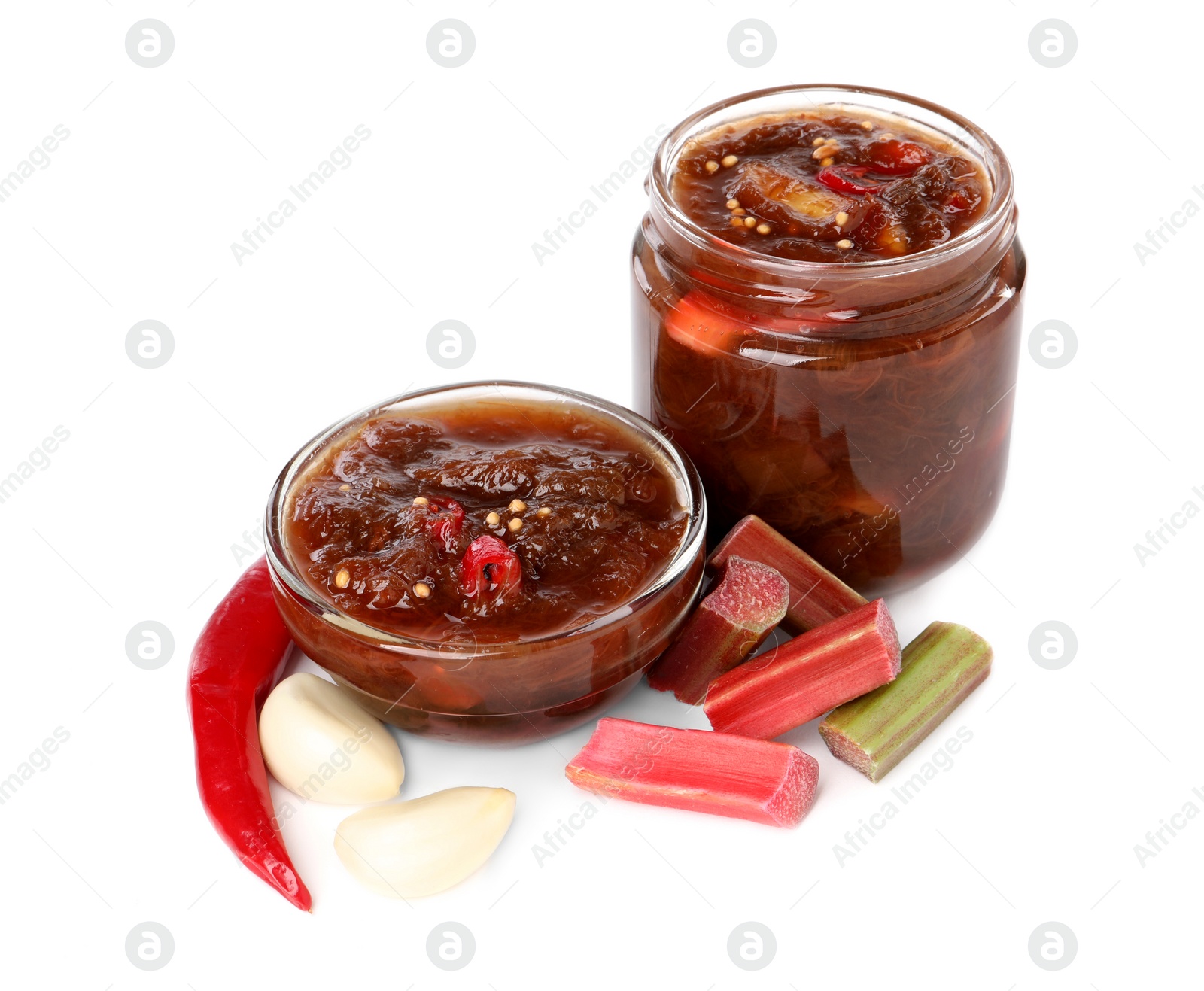 Photo of Tasty rhubarb sauce and ingredients isolated on white