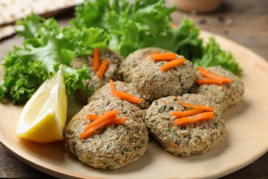 Photo of Plate of traditional Passover (Pesach) gefilte fish on table, closeup