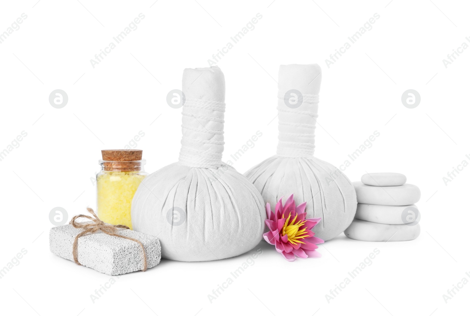 Photo of Herbal massage bags and different spa products on white background