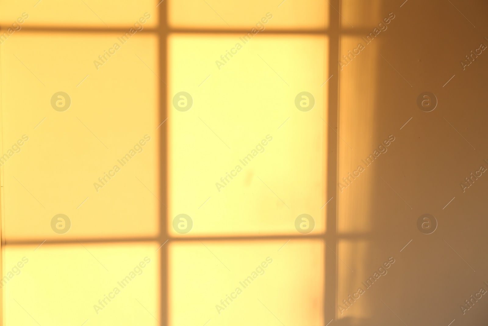 Photo of Light and shadow from window on wall