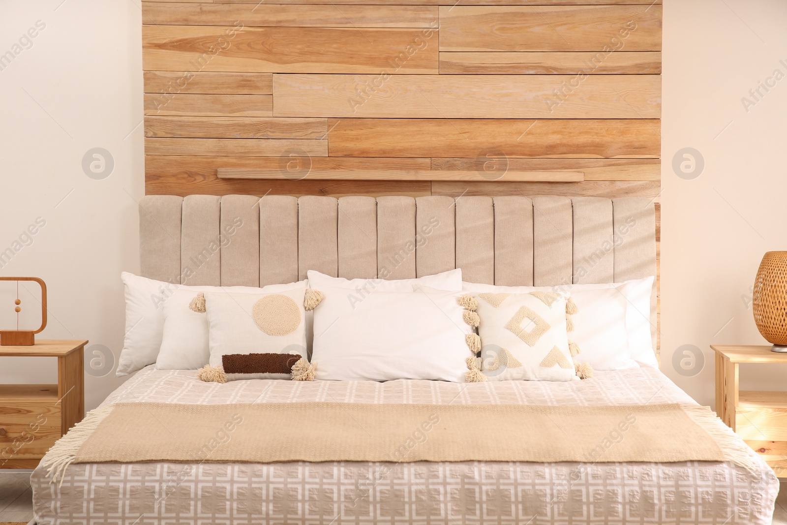 Photo of Stylish hotel room interior with comfortable bed