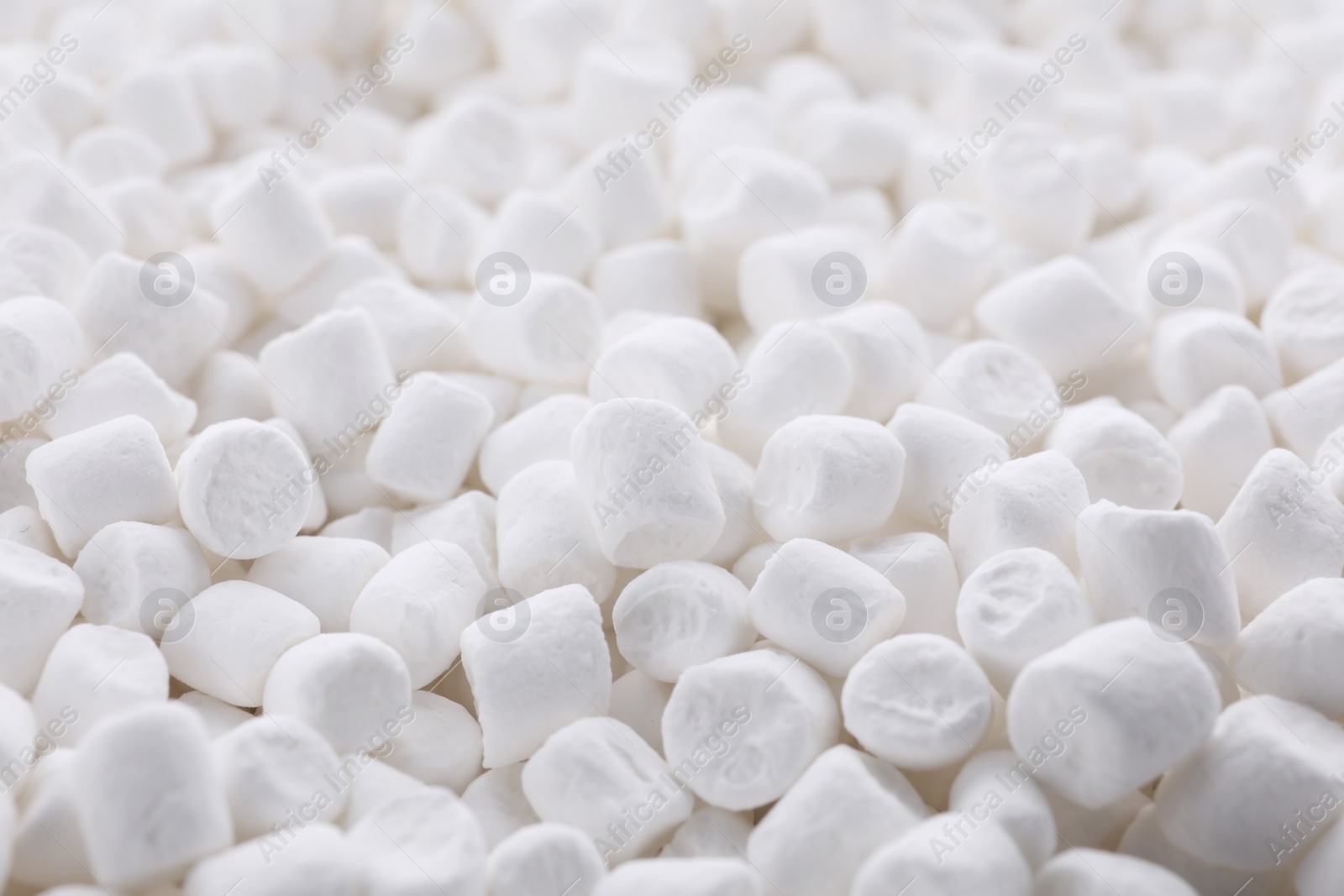 Photo of Many delicious sweet marshmallows as background, closeup