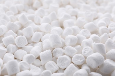 Photo of Many delicious sweet marshmallows as background, closeup