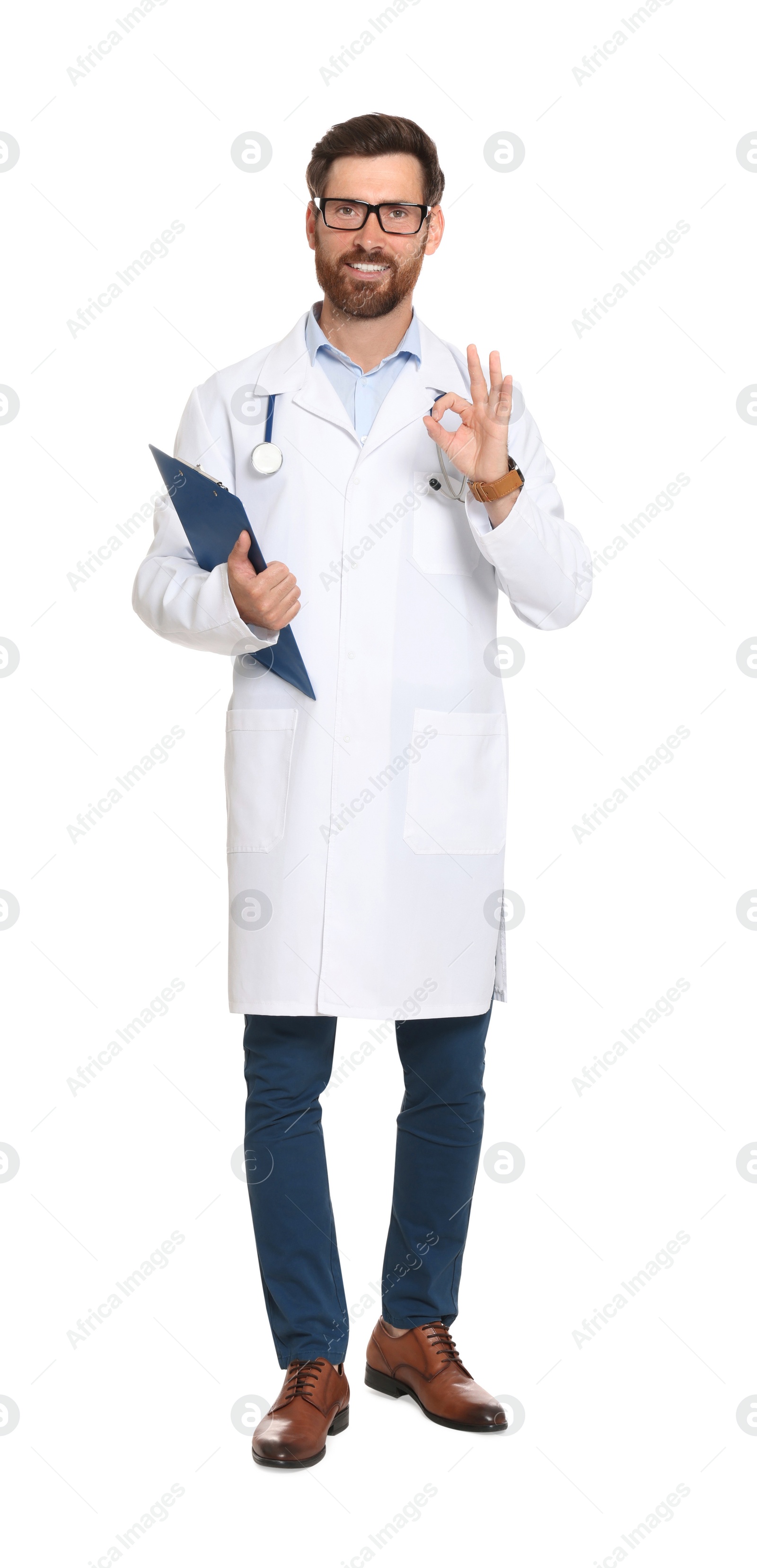 Photo of Full length portrait of doctor with clipboard on white background