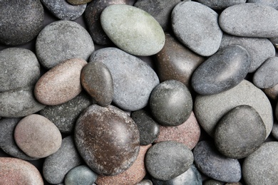 Composition with spa stones as background, top view