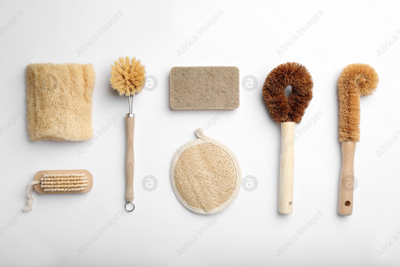 Photo of Flat lay composition with eco friendly products on white background