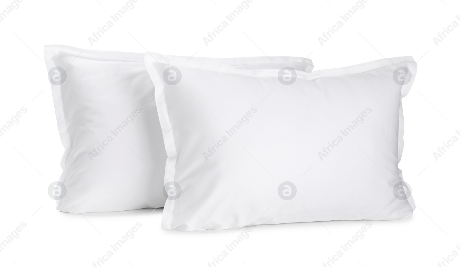 Photo of Two new soft pillows isolated on white