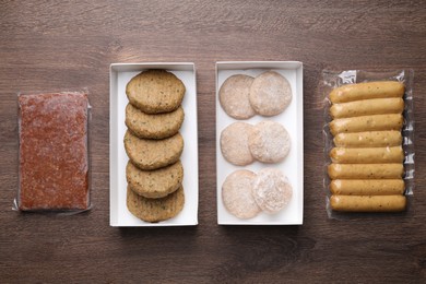 Different vegan products on wooden table, flat lay