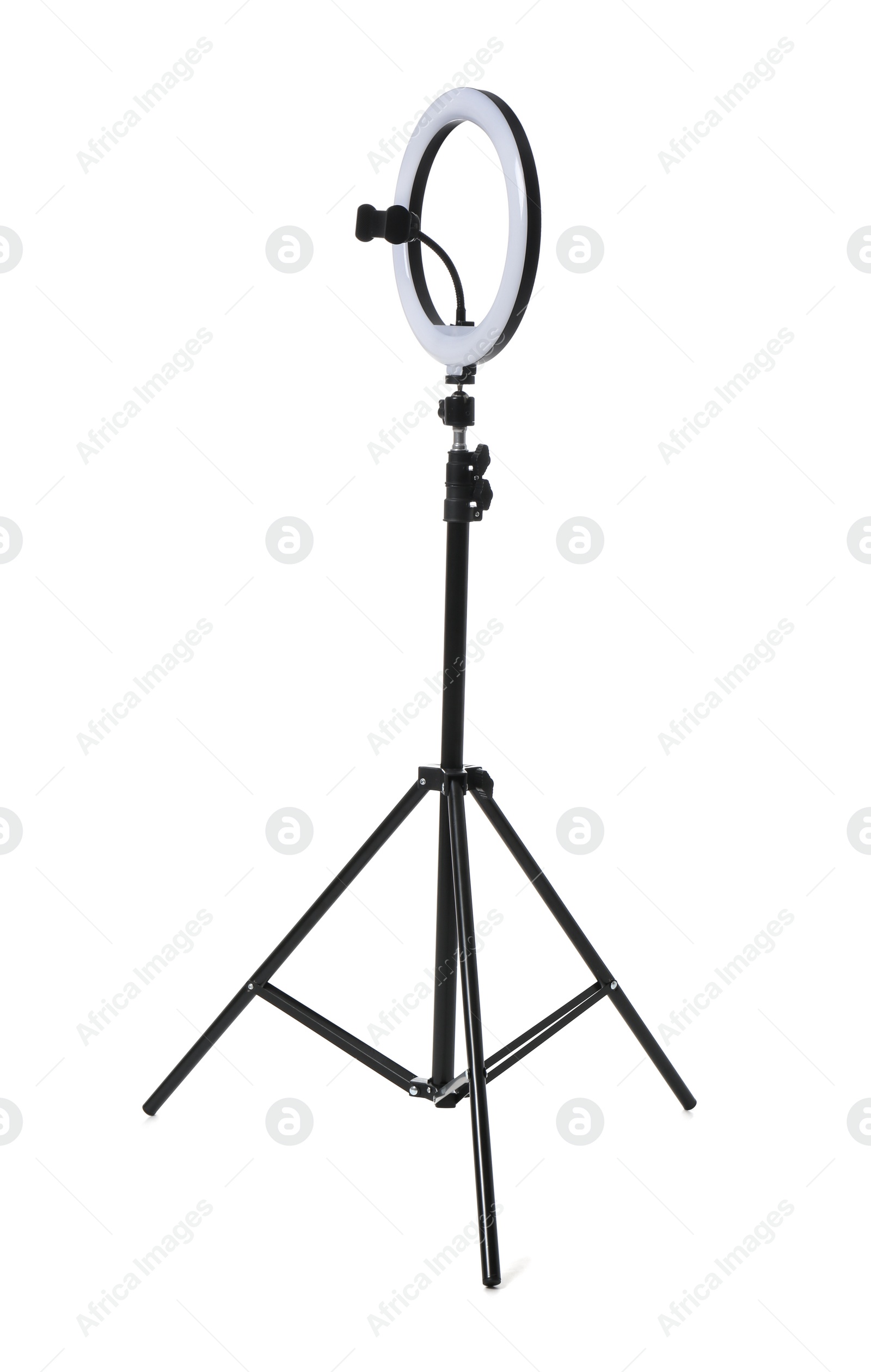 Photo of Modern tripod with ring light isolated on white