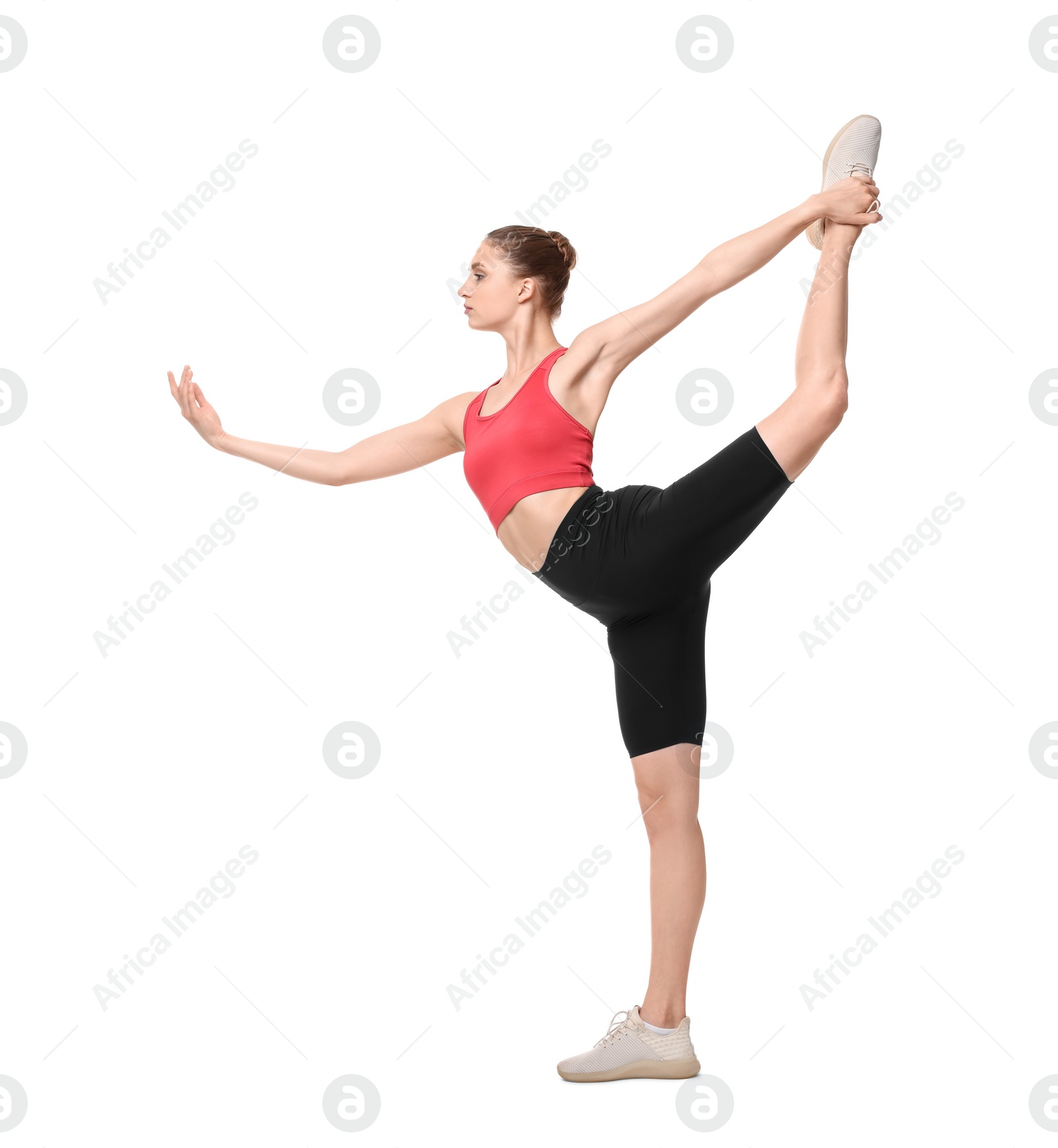 Photo of Young woman practicing yoga on white background