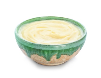 Photo of Bowl with tasty mashed potatoes on white background