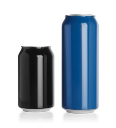 Photo of Aluminum cans with drinks on white background