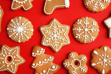 Tasty homemade Christmas cookies on color background, top view