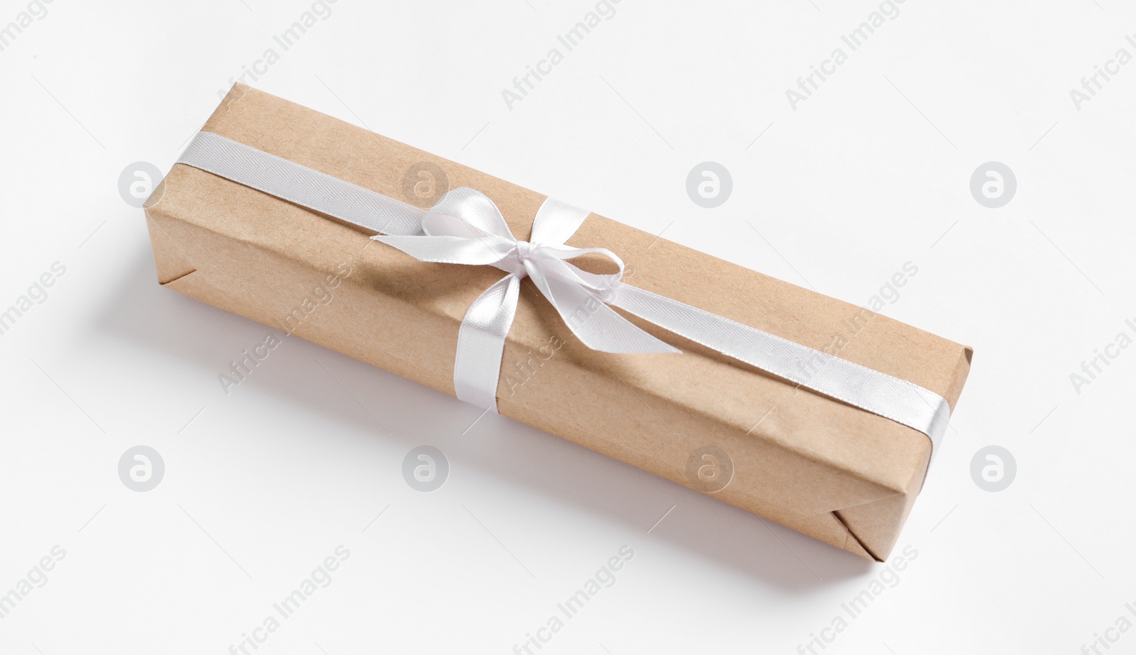 Photo of Beautifully wrapped gift box on white background