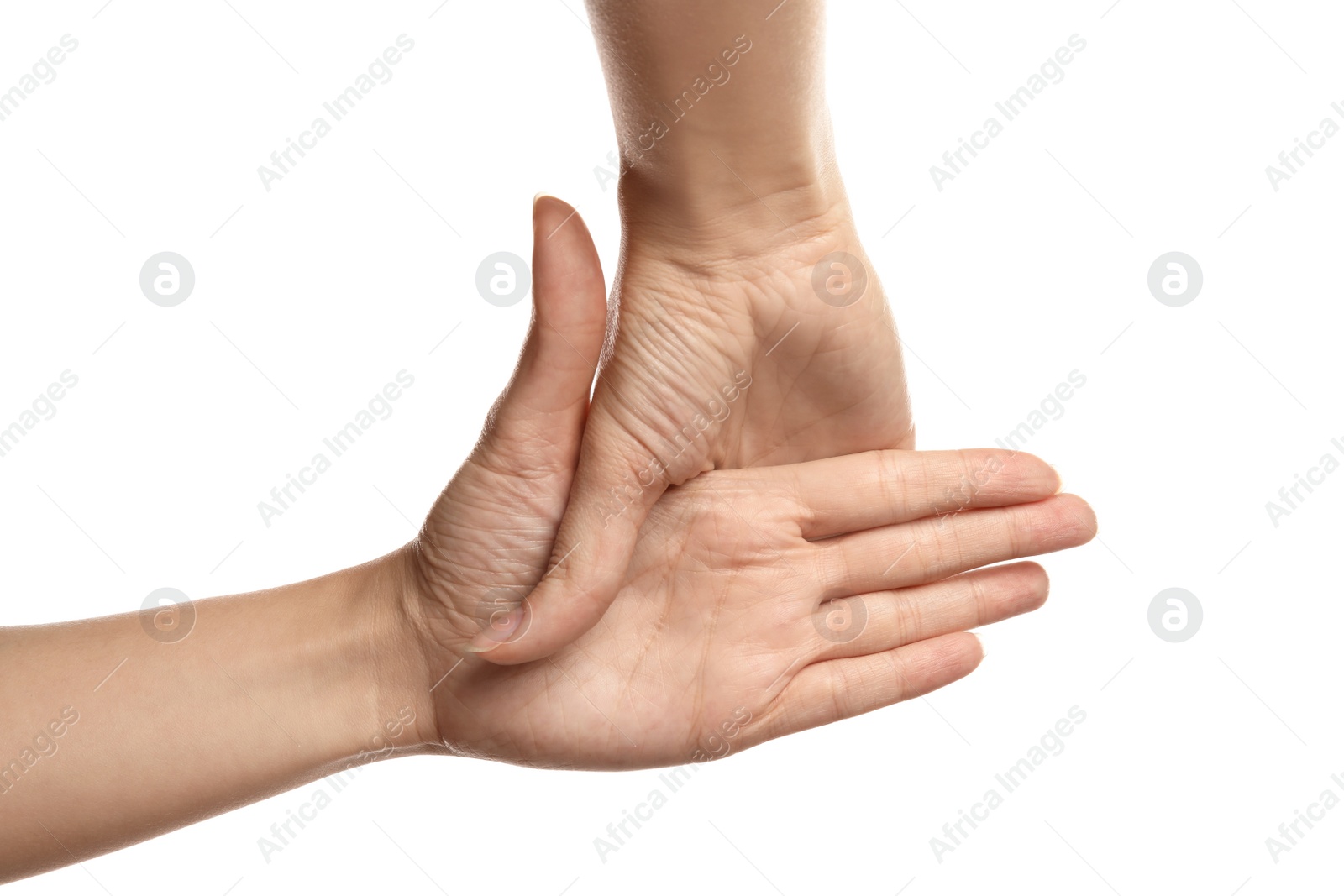 Photo of Woman showing hand sign on white background, closeup. Body language