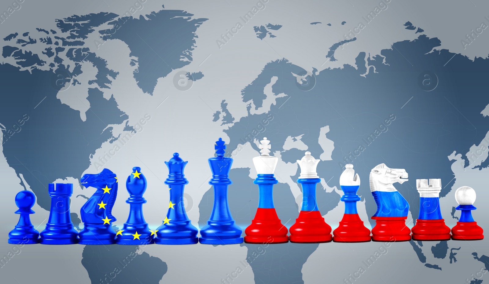 Image of Chess pieces in color of Russian and European Union flags against world map