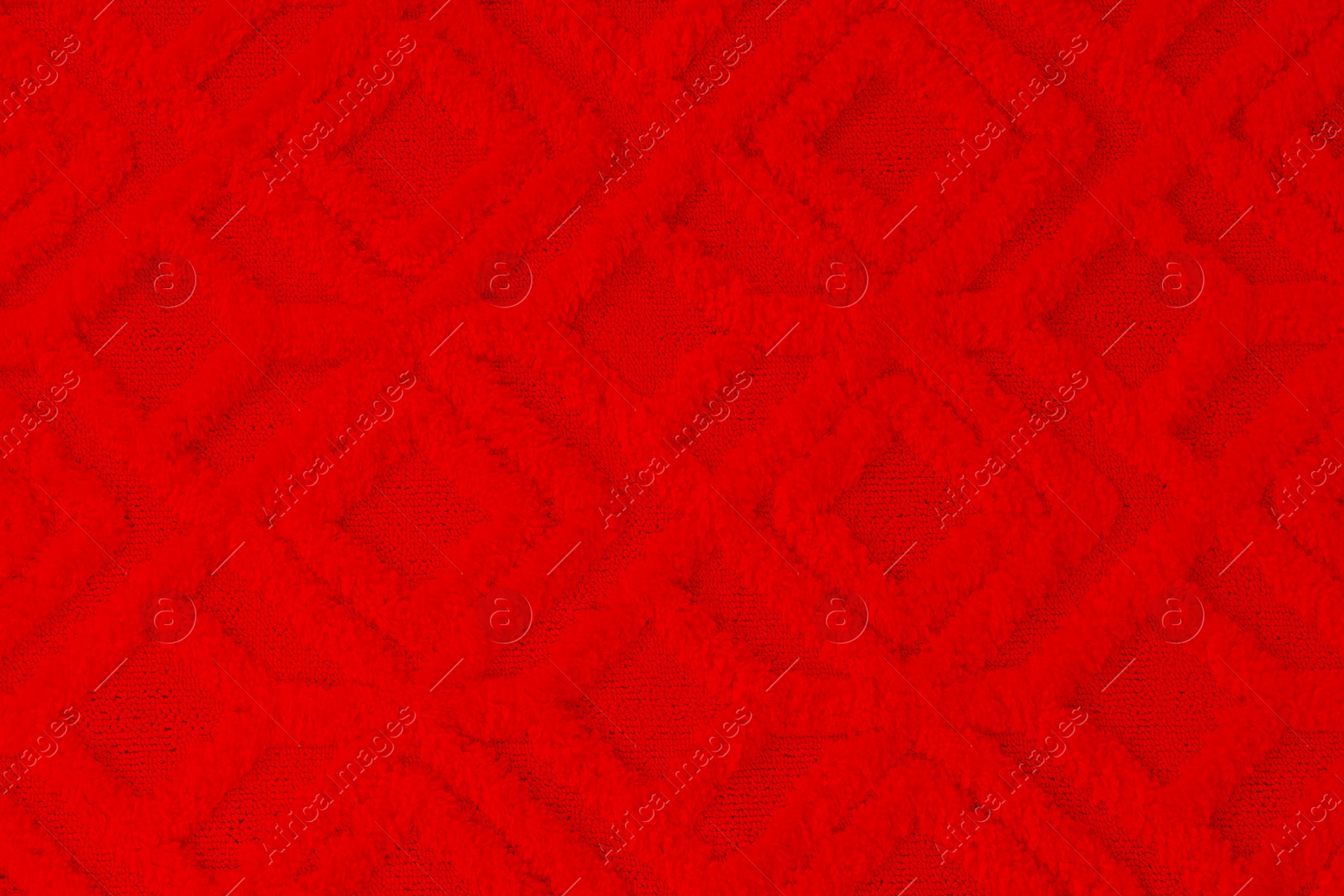 Image of Soft red carpet with pattern as background, top view