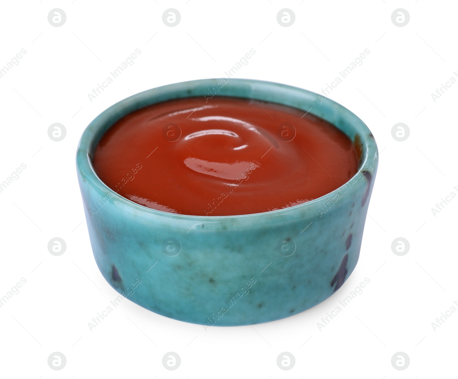 Bowl of tasty ketchup isolated on white. Tomato sauce Photo of Bowl of tasty ketchup isolated on white. Tomato sauce