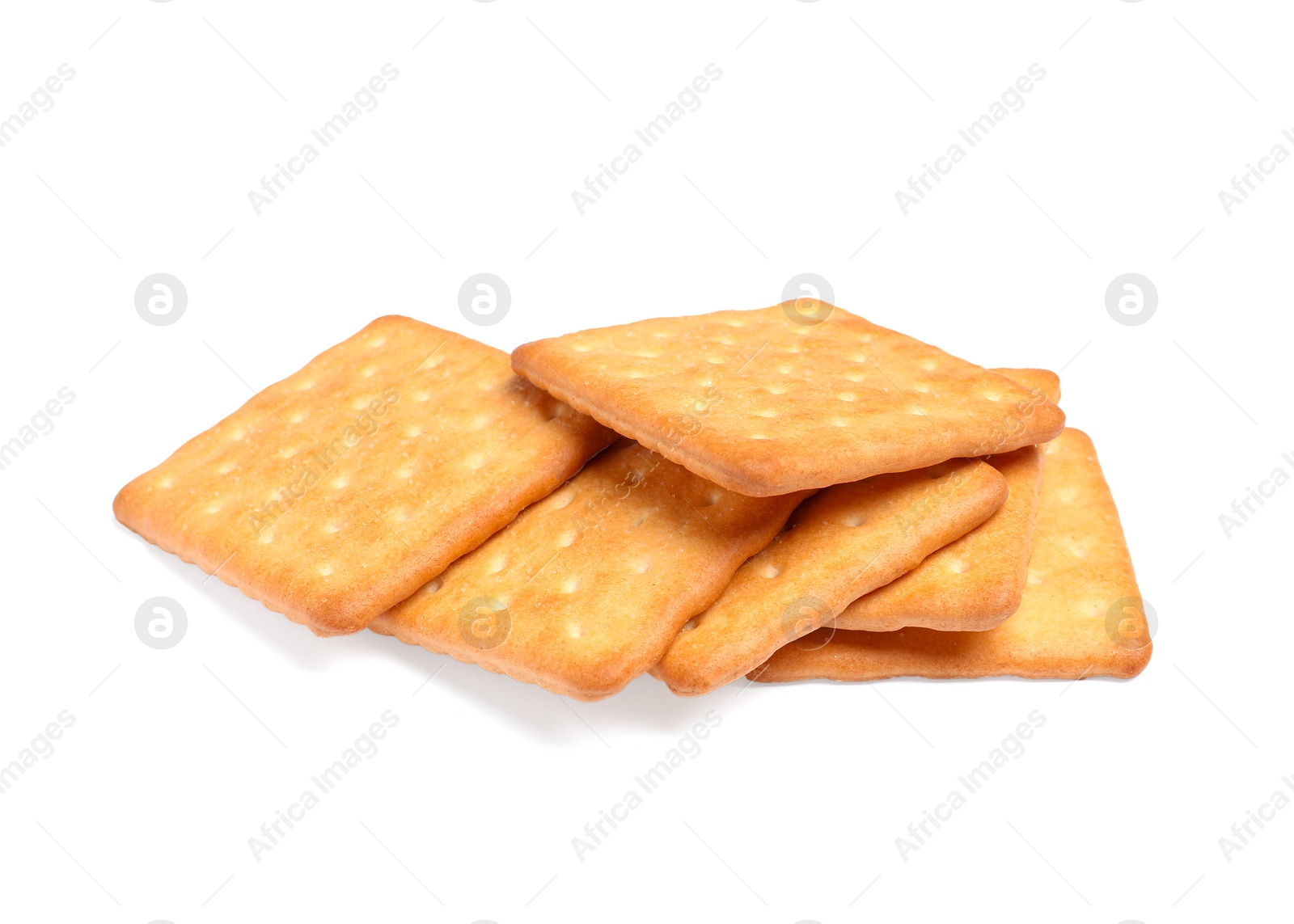 Photo of Tasty crispy square crackers isolated on white