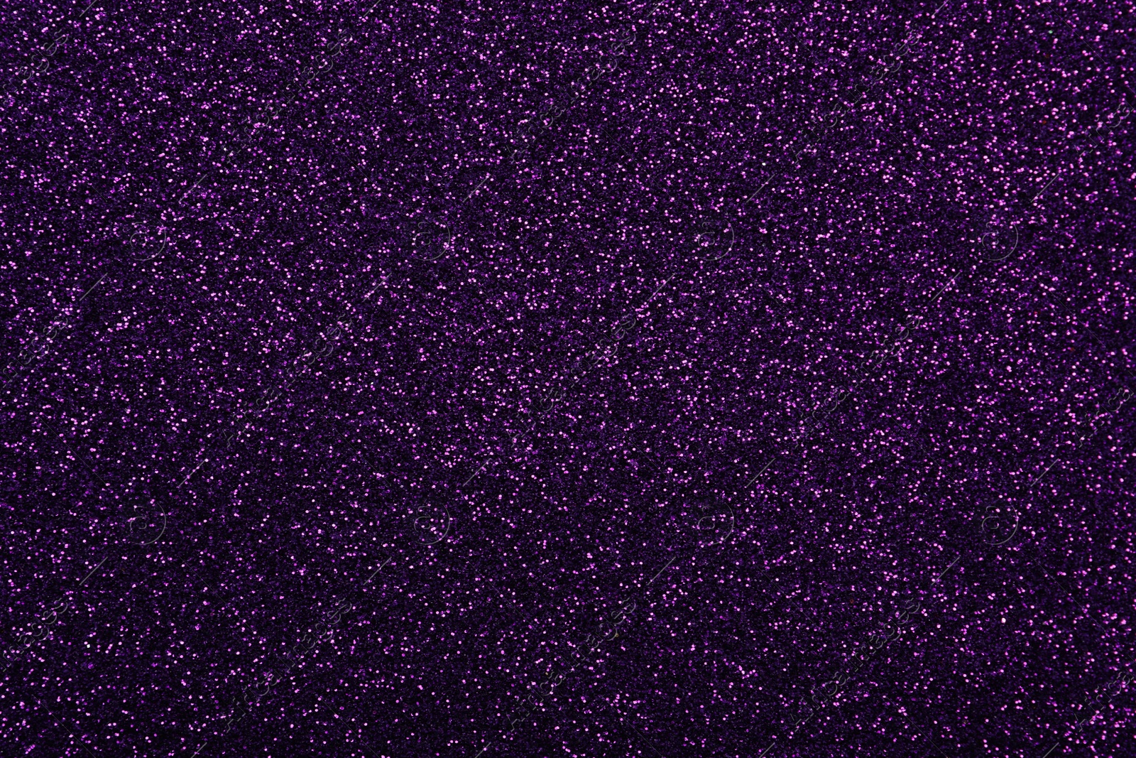 Photo of Shiny dark purple glitter as background, closeup