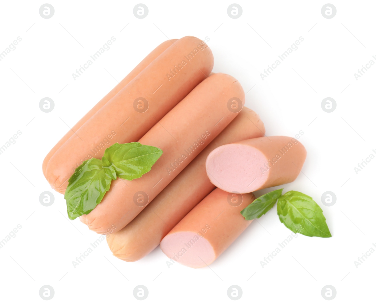 Photo of Whole and cut delicious boiled sausages with basil on white background, top view