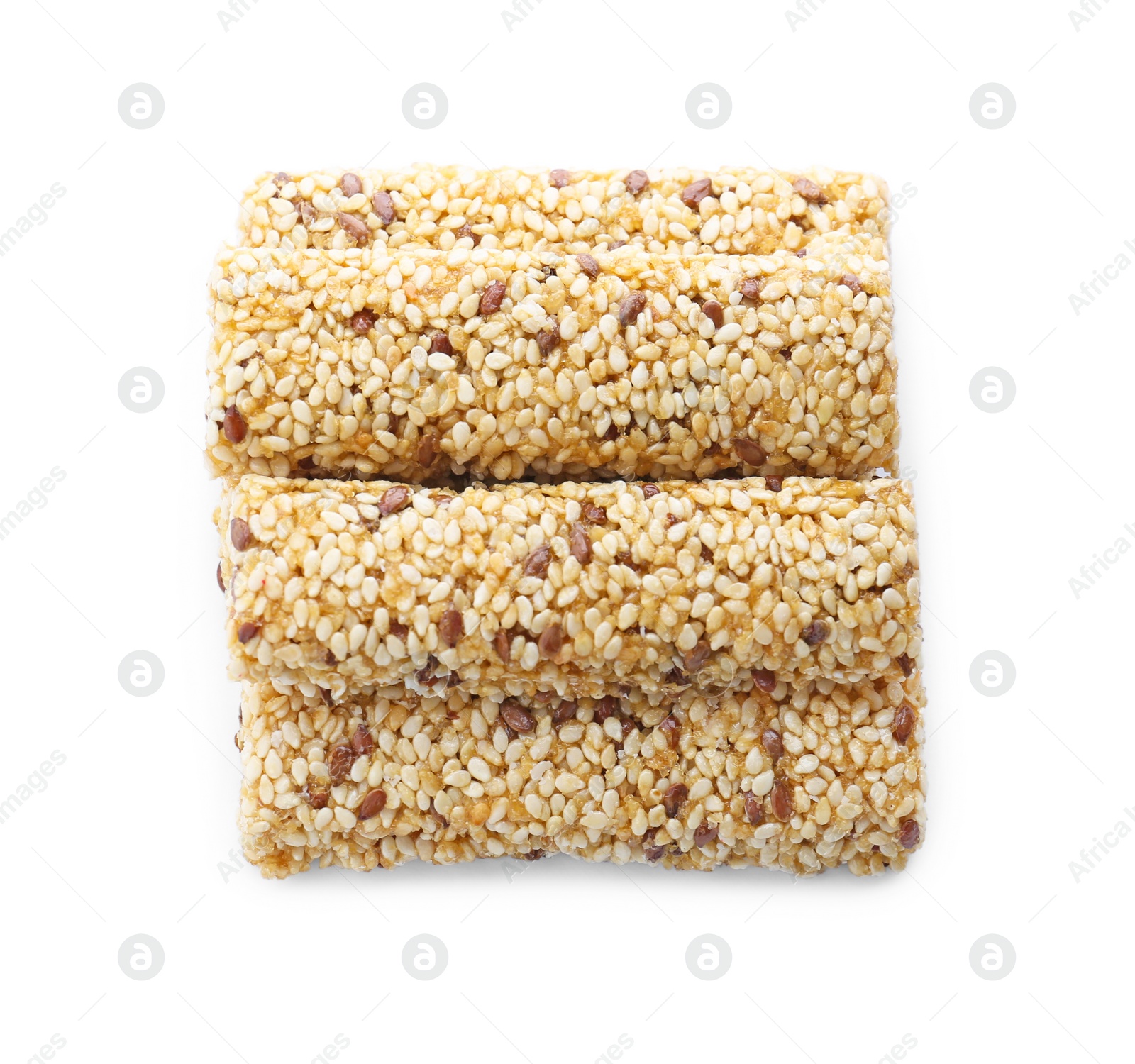 Photo of Tasty sesame seed bars isolated on white