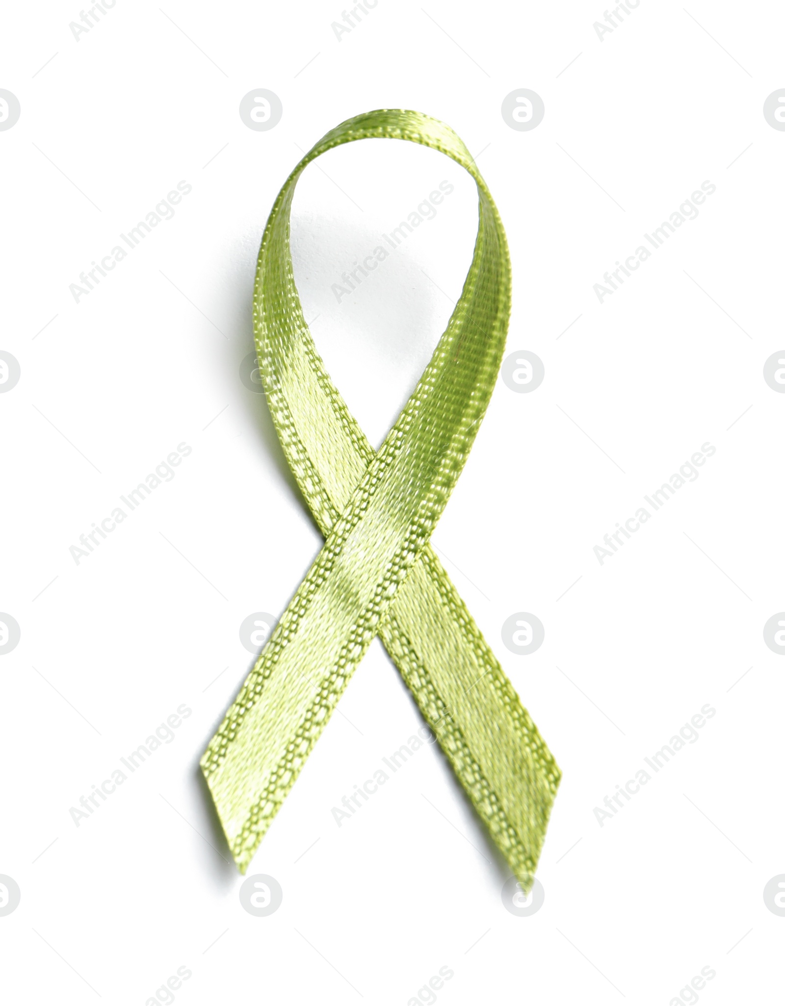 Photo of Green ribbon on white background, top view. Cancer awareness