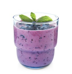 Glass of tasty blueberry smoothie with mint on white background