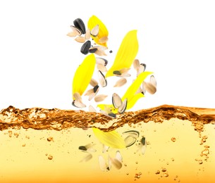 Image of Sunflower seeds and petals falling into cooking oil on white background