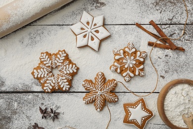 Flat lay composition with delicious homemade Christmas cookies on wooden table