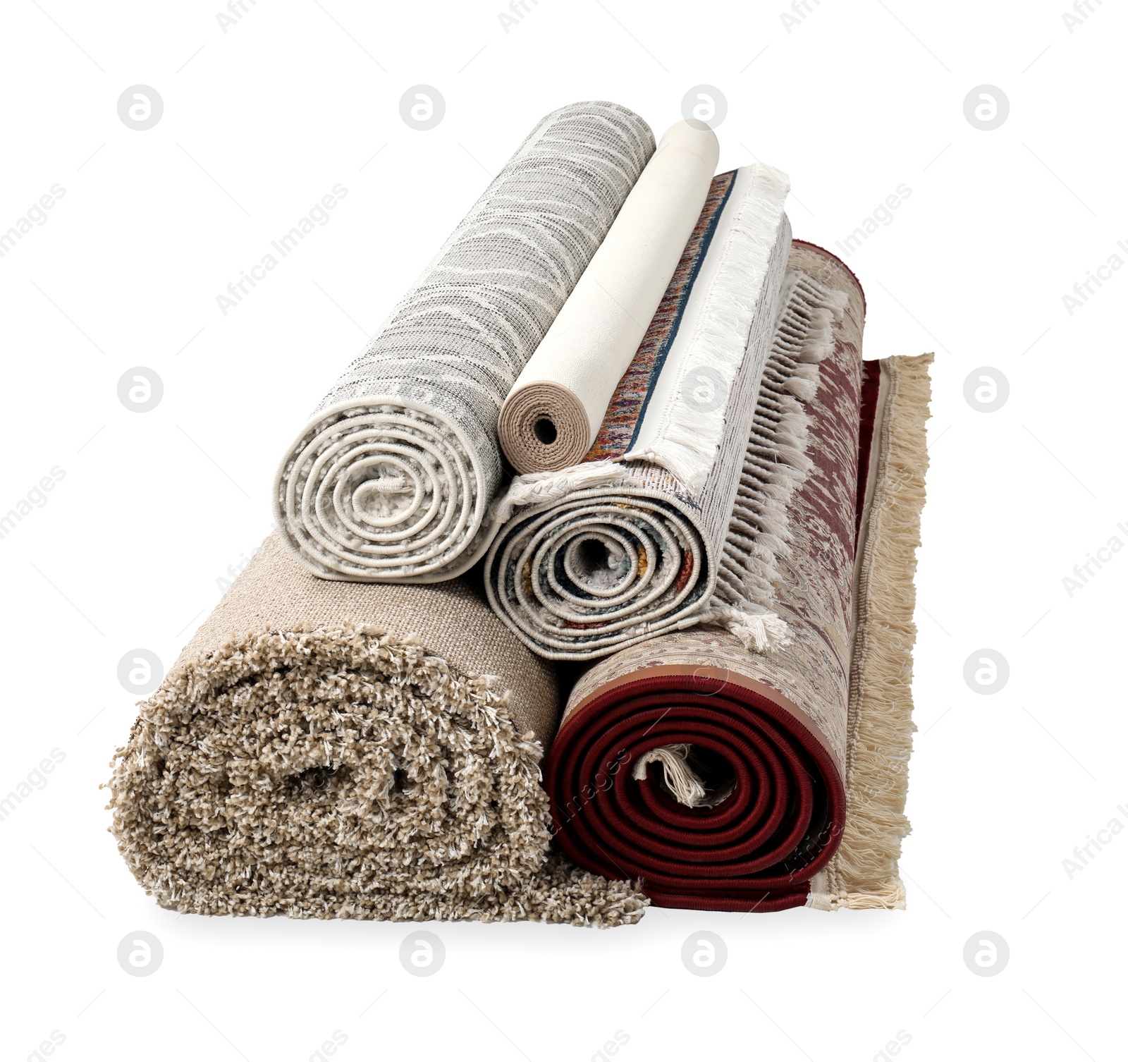 Photo of Rolled carpets on white background. Interior element