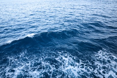 Surface of beautiful sea water with foam as background