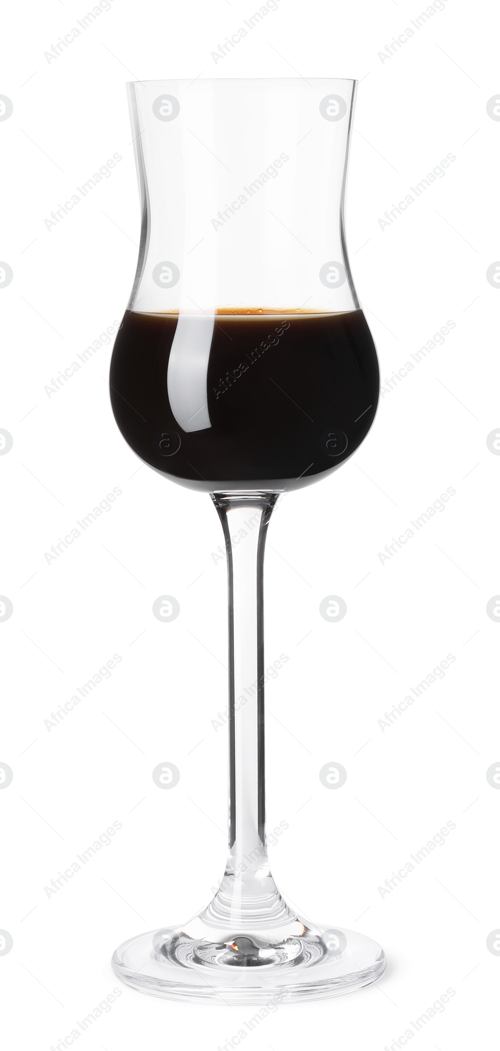 Photo of Shot glass with coffee liqueur isolated on white