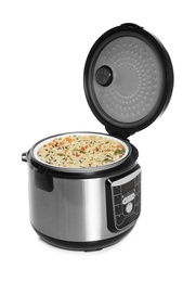 Photo of Delicious rice with vegetables in modern multi cooker on white background