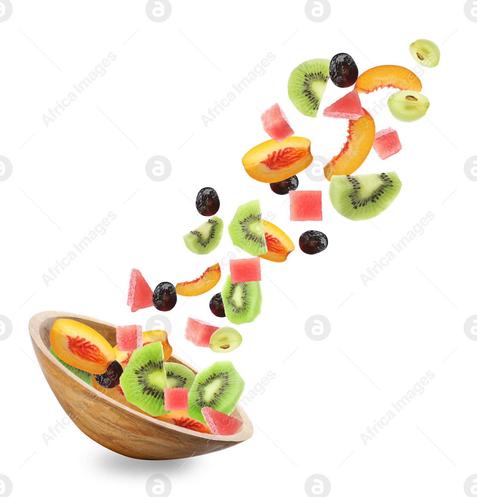 Image of Fresh tasty fruits and berries falling into bowl on white background