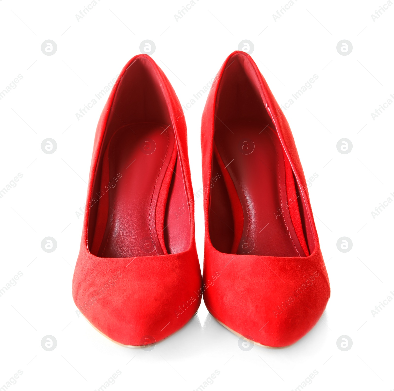 Photo of Pair of red female shoes on white background