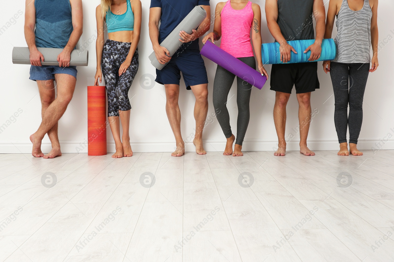 Photo of Group of young people waiting for yoga class