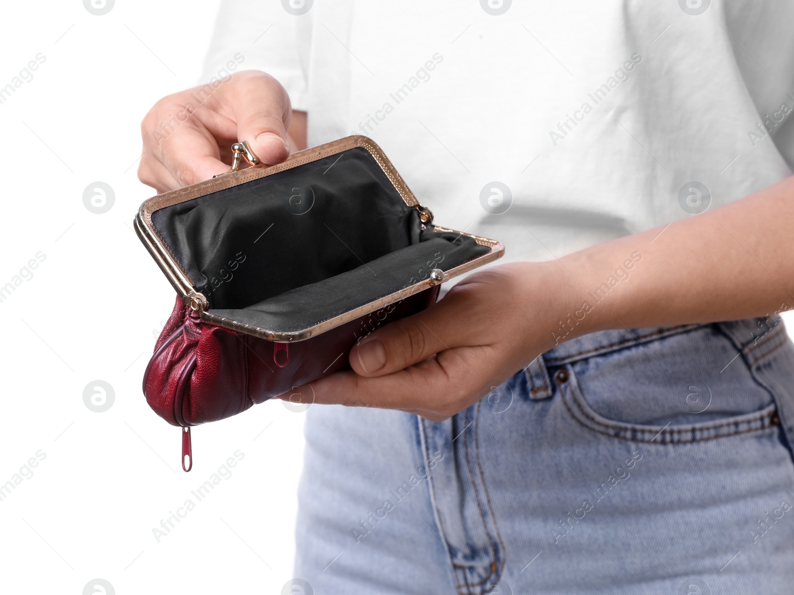 Photo of Poor woman with empty wallet on white background, closeup