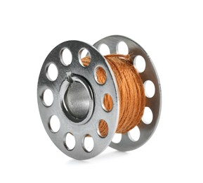 Photo of Metal spool of dark orange sewing thread isolated on white