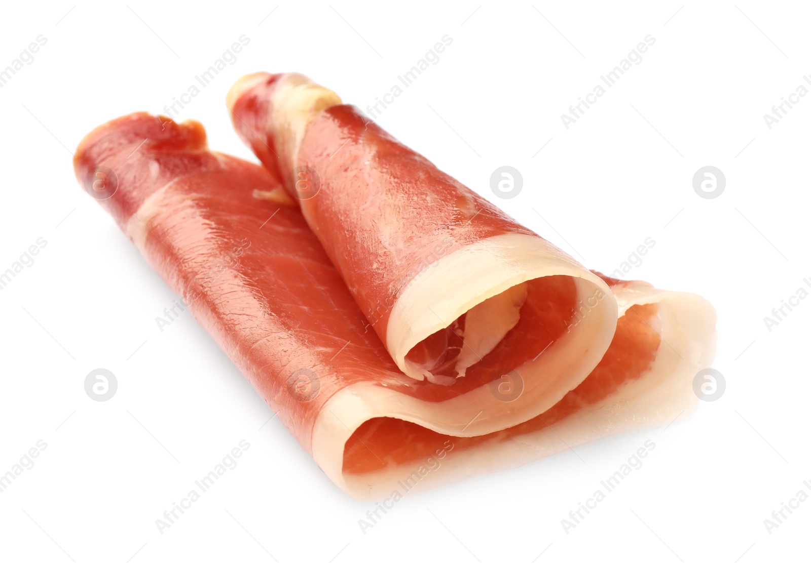 Photo of Rolled slice of tasty jamon isolated on white