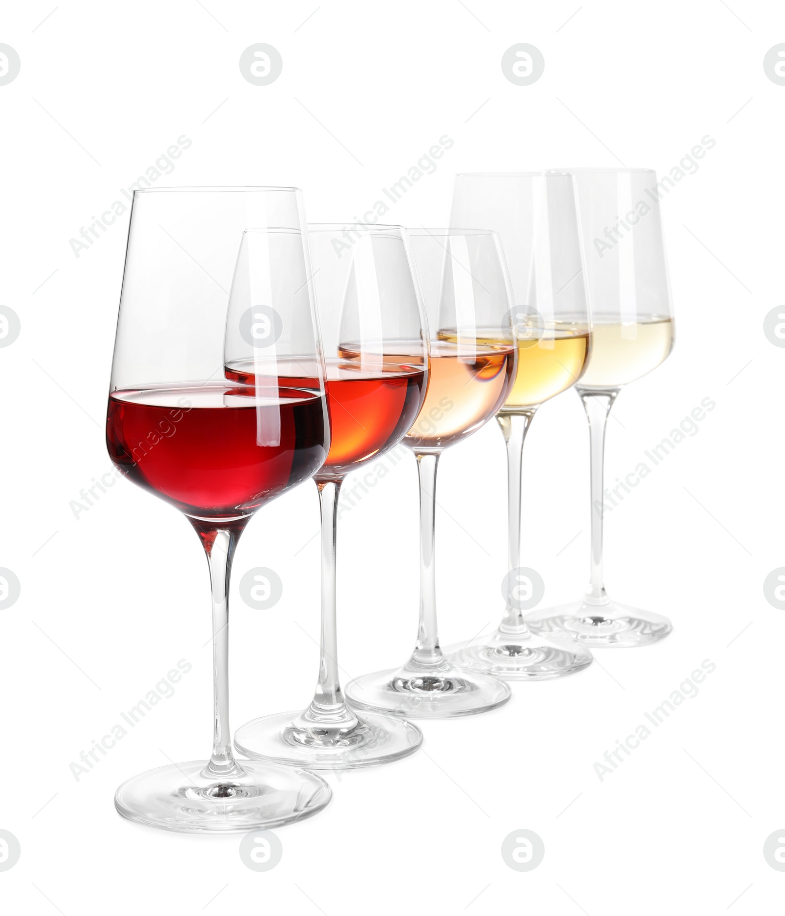 Photo of Row of glasses with different wines on white background