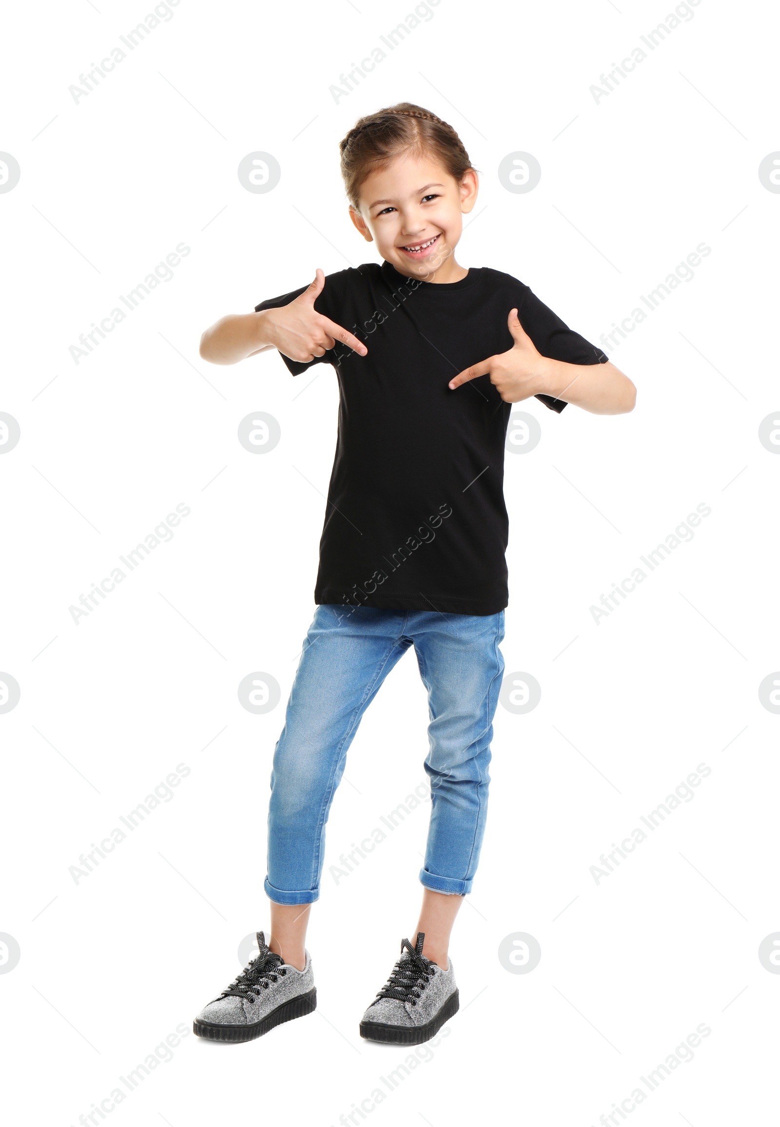 Photo of Little girl in t-shirt on white background. Mockup for design