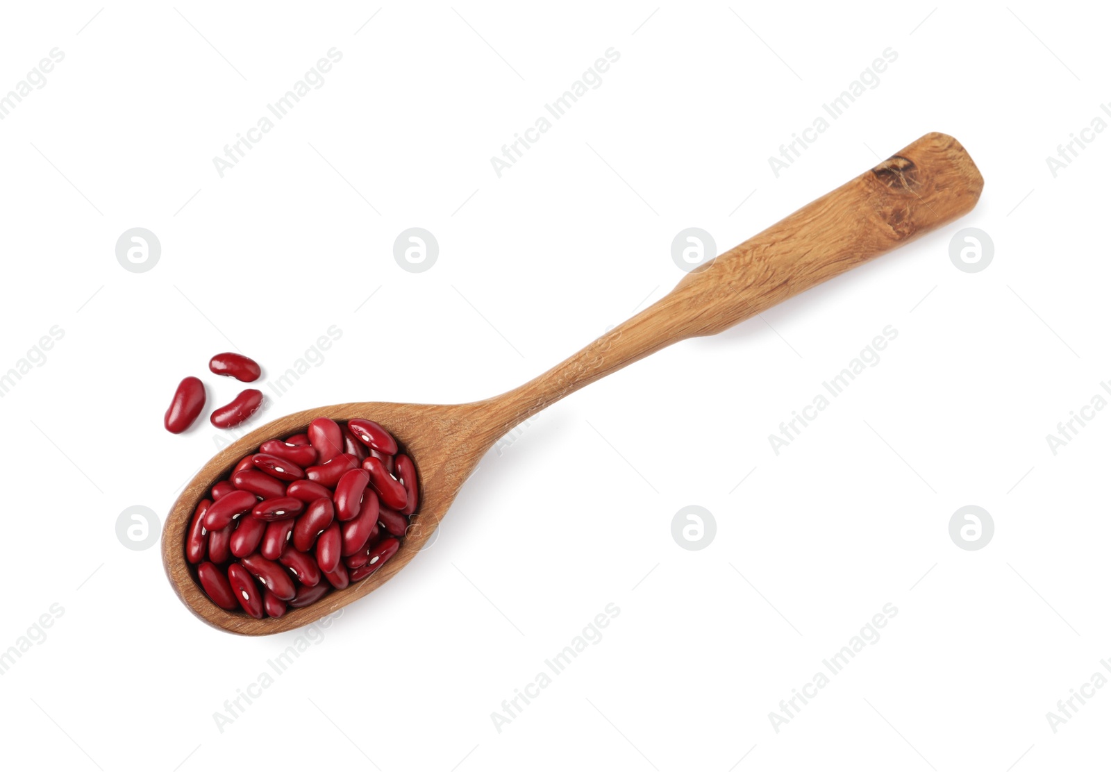 Photo of Raw red kidney beans with wooden spoon isolated on white, top view