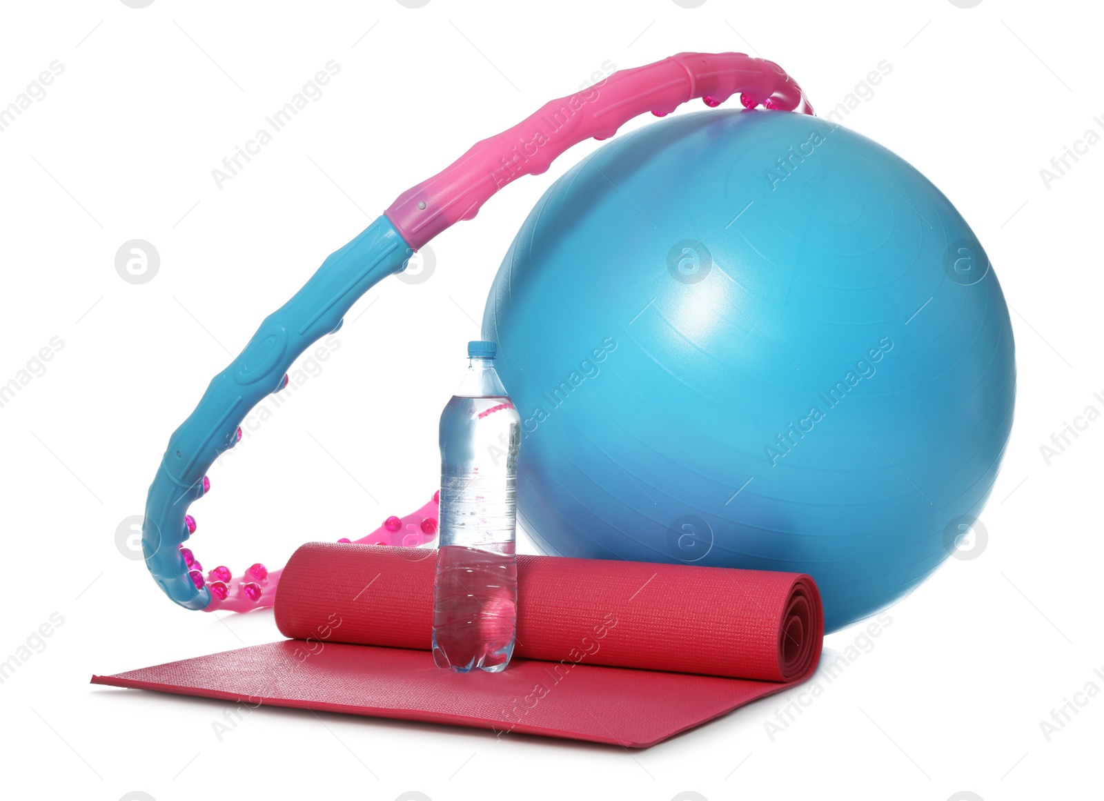 Photo of Fitness ball, yoga mat, bottle of water and hula hoop isolated on white