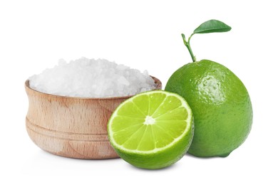 Image of Limes and salt isolated on white. Margarita cocktail ingredients