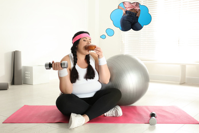 Image of Overweight woman dreaming about slim body while eating bun at gym